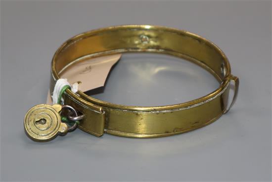 A 19th century brass dog collar with padlock and key diameter 9cm